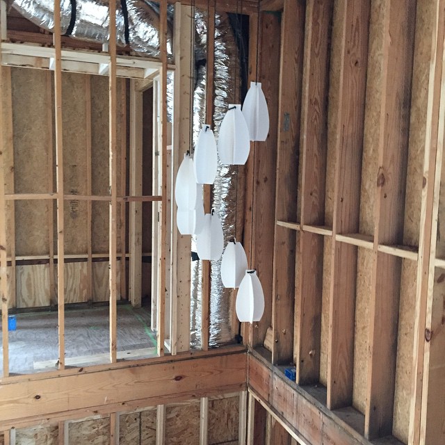Foursquare Builders Project Managers know how to resolve the details. We take the time to build full mock up of a light fixture for the entry stairs. Our clients now can understand the scale and placement of the fixture within the space.