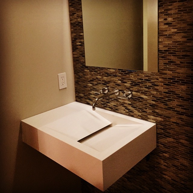 Craftsmanship expressed in a custom one-off sink designed by a Foursquare Builders Project Manager. Needless to say our clients were ecstatic over this unique design.