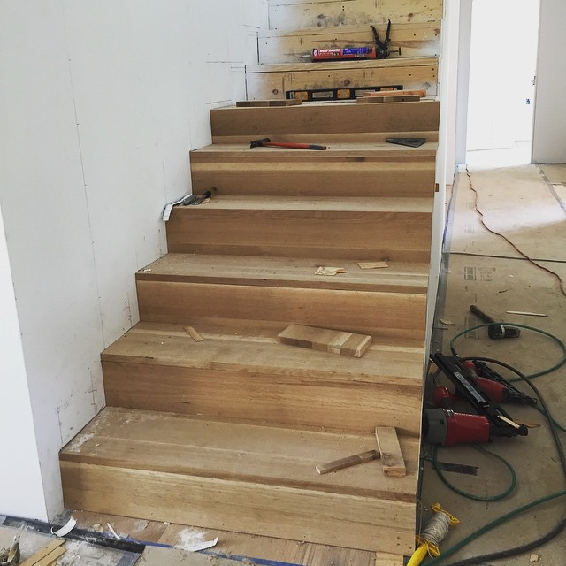 Solid white oak stair treads and risers on our Duck Lake remodel. @foursquarebuilders