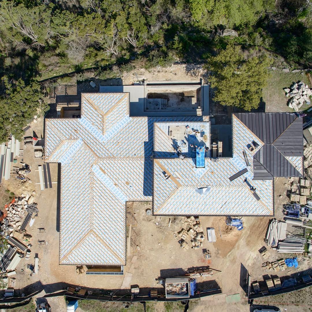 Ventilated roof structure provides for an energy efficient home. Built by @foursquarebuilders Designed by @dc_architecture Drone Photo by @redpantsstudio