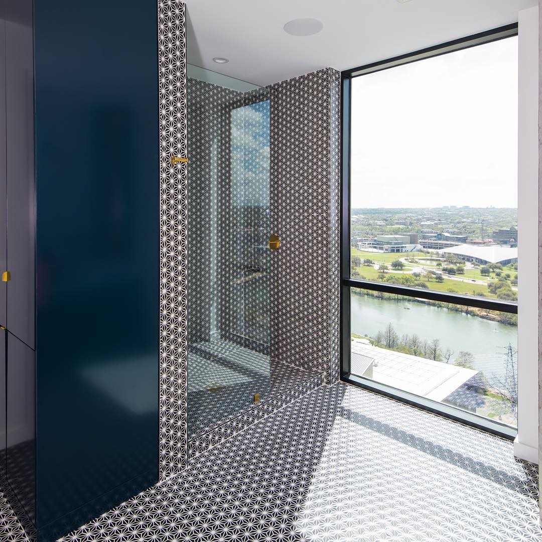 Recently completed Seaholm Condo finish-out.  Bathroom overlooking Lady Bird Lake. Built by @foursquarebuilders Design by @slicdesign Photo by @redpantsstudio