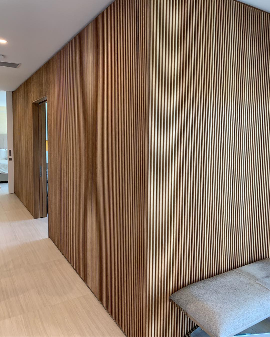 Simple yet complex white oak slat wall details. Designed by @dc_architecture Built by @foursquarebuilders and @flitchatx