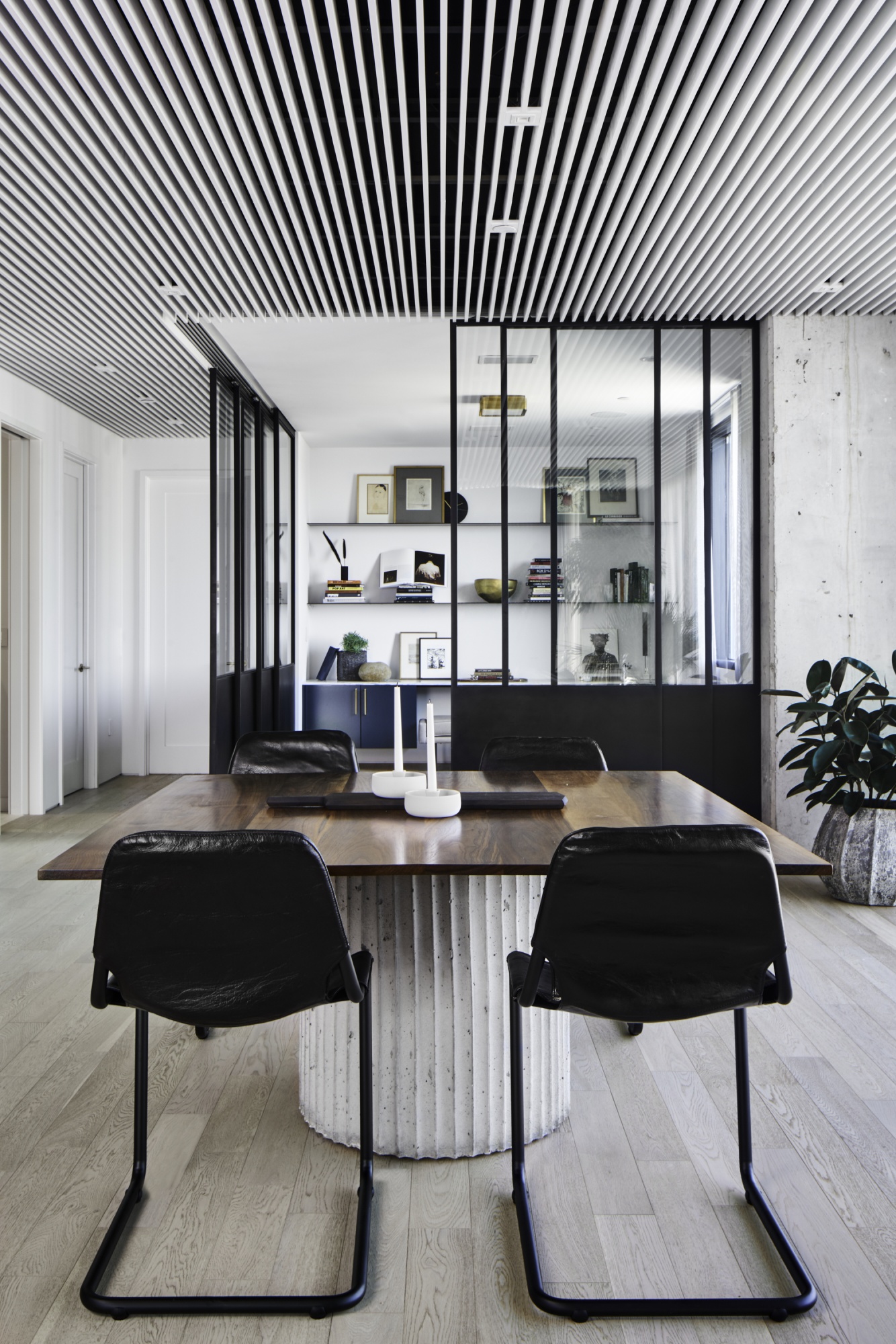 Slatted suspended ceiling creates openness throughout.