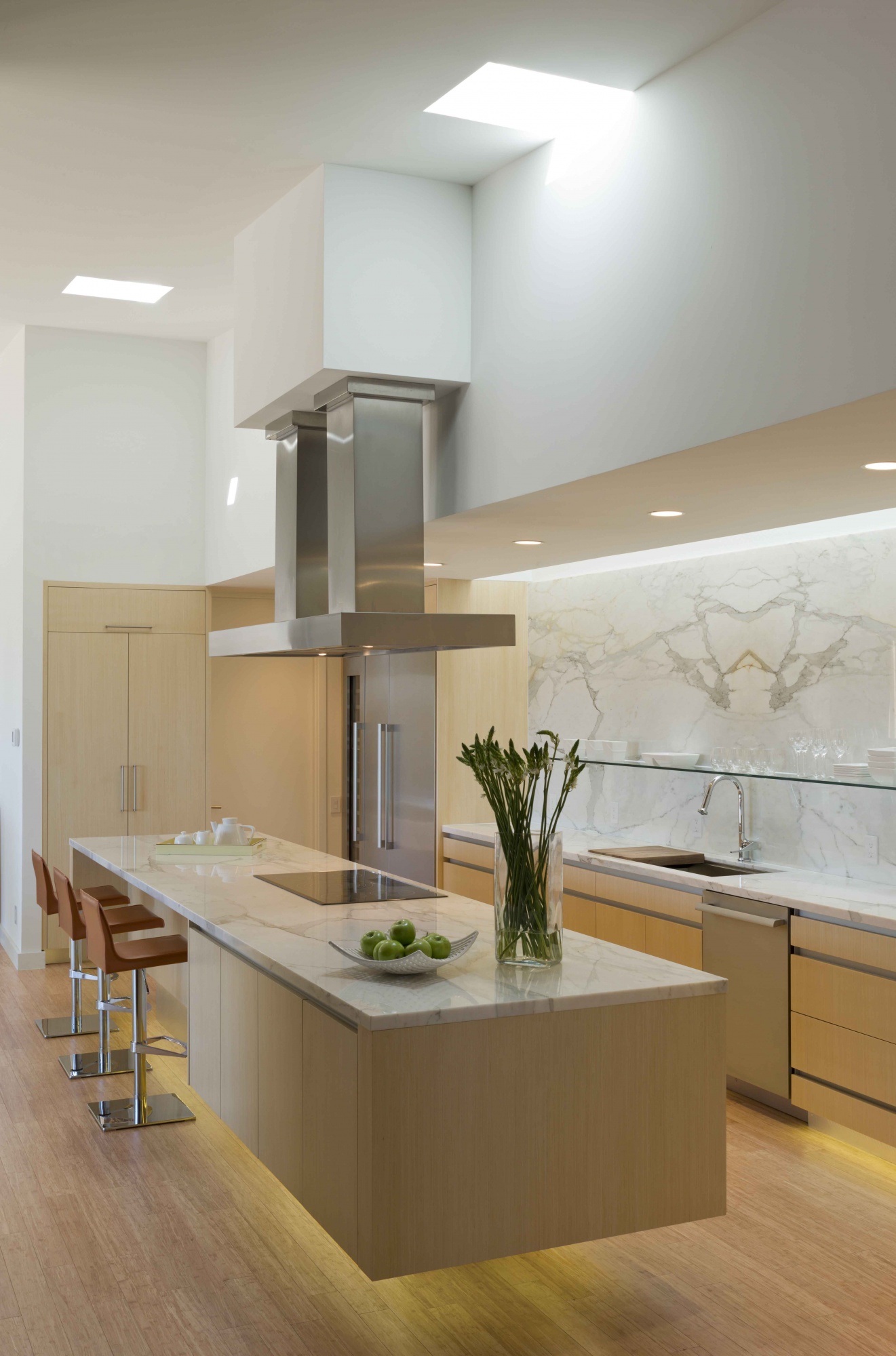 The appearance of levitation is experienced within the kitchen cabinetry.
