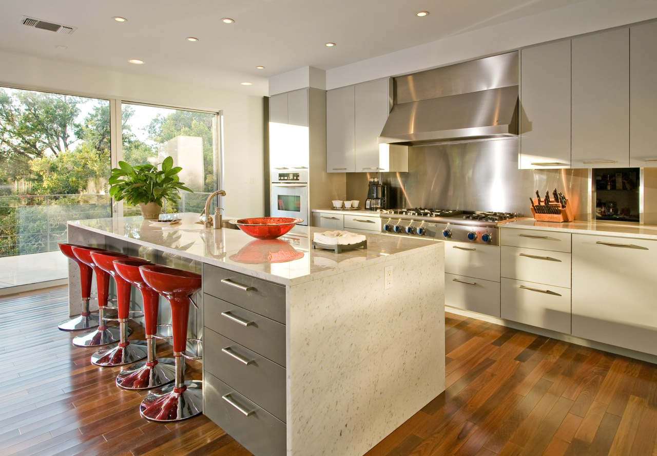 Pro style kitchen features marble countertops.