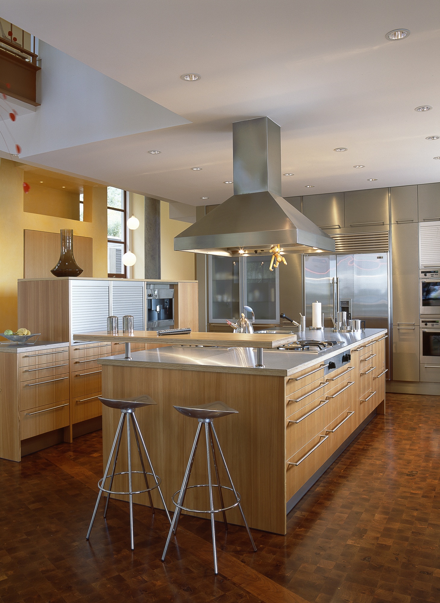 Bulthaup kitchen featuring stainless steel countertops.