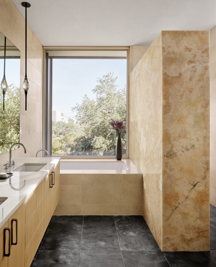 Clean lines and simple tones make this stunning master bath appear to be unassuming.