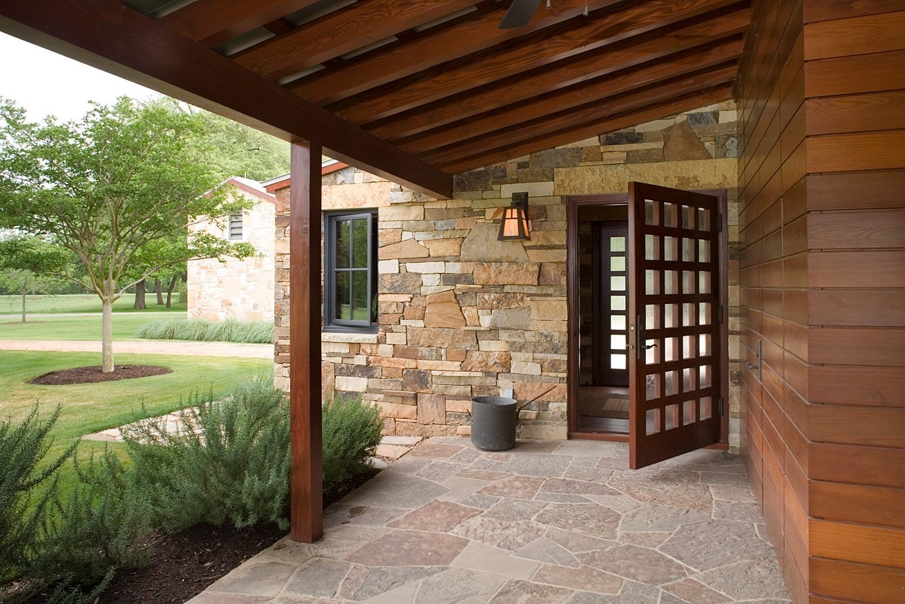 Rugged meets refined with this stone and wood exterior.