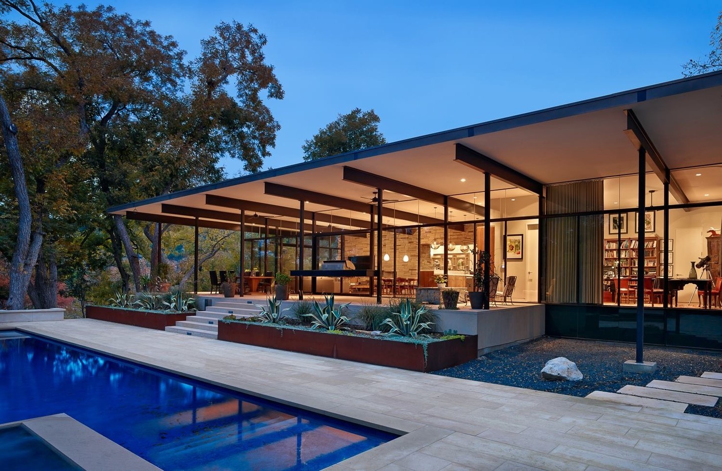 A roof over your head at all times. We love this dramatic overhanging roof that creates the perfect outdoor space.