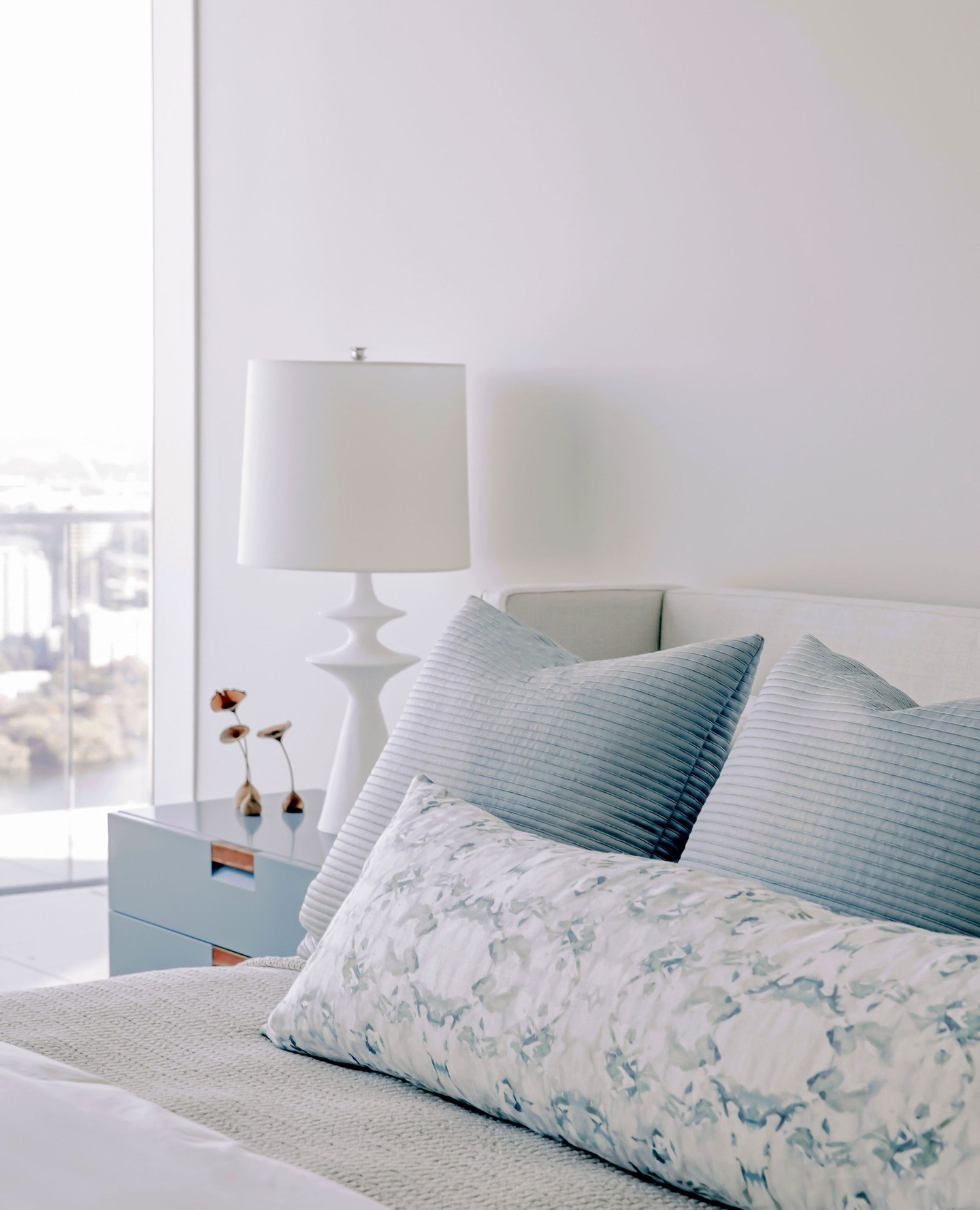 Step into serenity.  This breathtaking bedroom in soothing shades of blue offers a tranquil haven, where peaceful nights meet captivating views.  ⁠
#TranquilViews⁠
⁠
@urbanspaceinteriors⁠
@theindependentaustin⁠
⁠
⁠