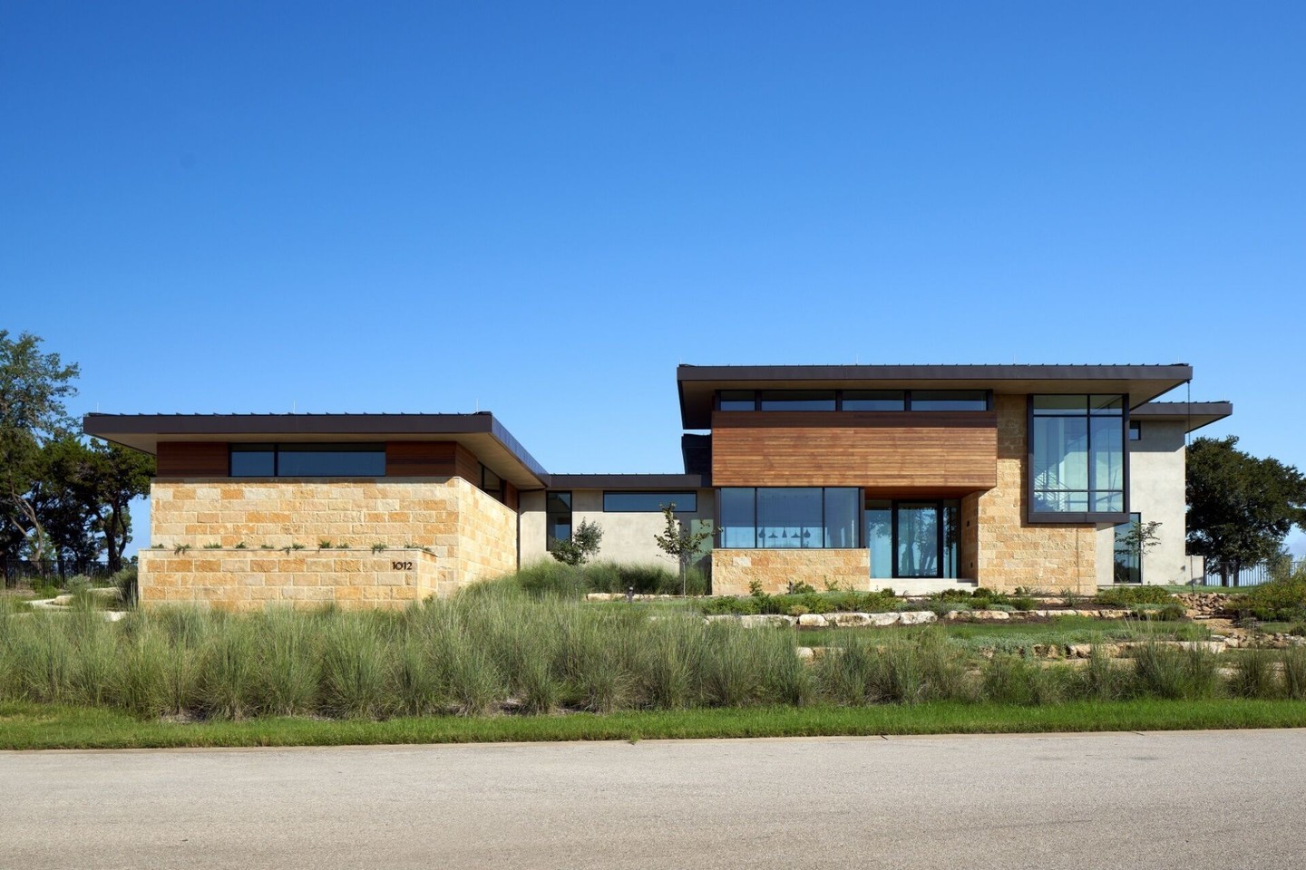 Our Watercliff project required us to think creatively about excavation and site preparation. The steep slope was a challenge but we were able to minimize the environmental impact while creating a solid foundation. The result is a home that looks like it's organically jutting out from the cliff, offering its owners unparalleled views and outdoor experiences at every level.

Architect: @dc_architecture