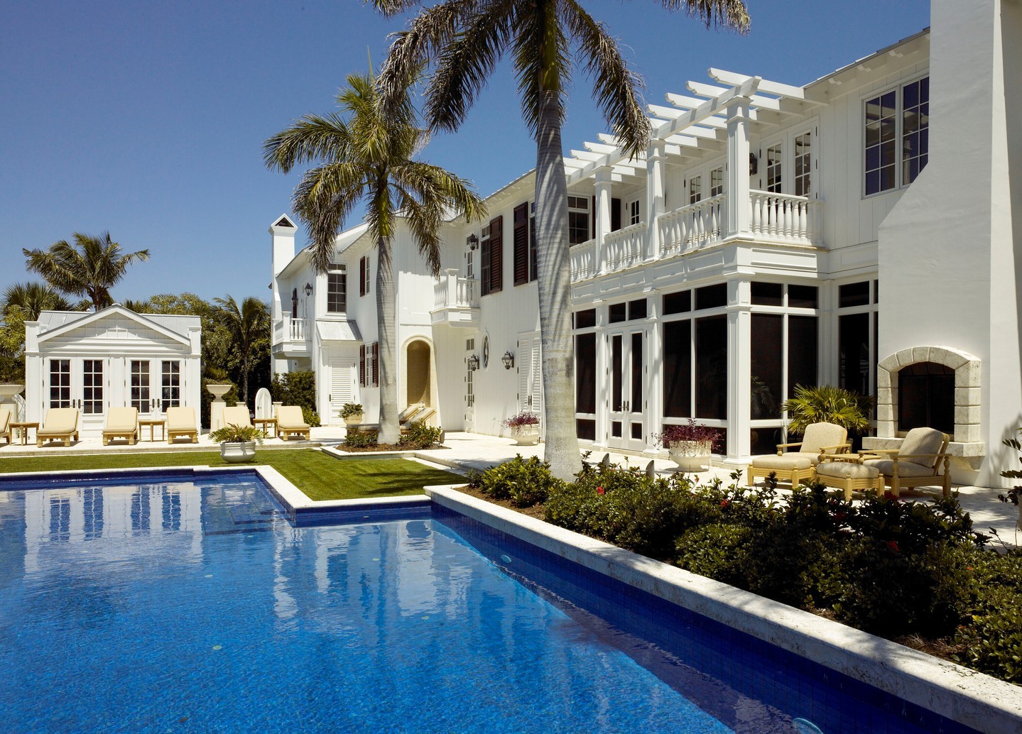 Ocean air changes everything - from scheduling concrete pours to picking fasteners. Local crews who knew island construction made the difference at this waterfront home built in the West Indies style.