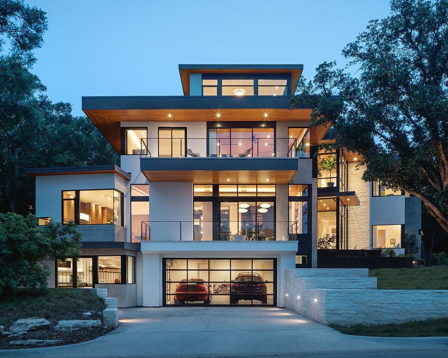 Designed to maximize its infill lot, this four-story Rollingwood home offers downtown views, a rooftop terrace, and thoughtful features like an elevator and woodworking shop. Gorgeous exterior shot if we do say so ourselves.

Architect: Chris Davenport @jchristopherarchitecture