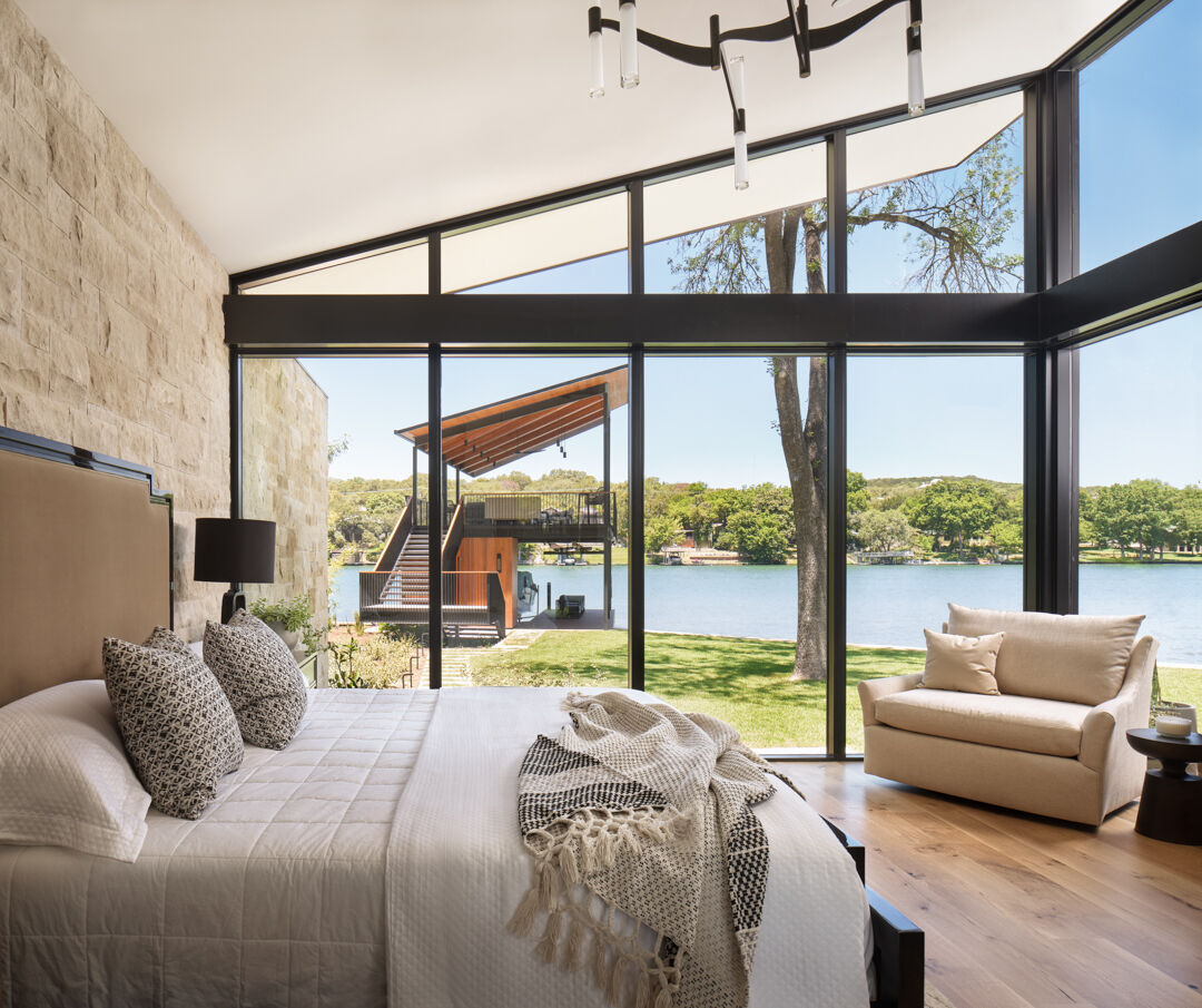 Transformed this Lake Austin property into the ultimate family retreat. Floor-to-ceiling glass in the primary suite frames those stunning water views while connecting to all the fun below.

Photography: @caseycdunn
Architect: @breckstudio
Interior Design: @highcamphome