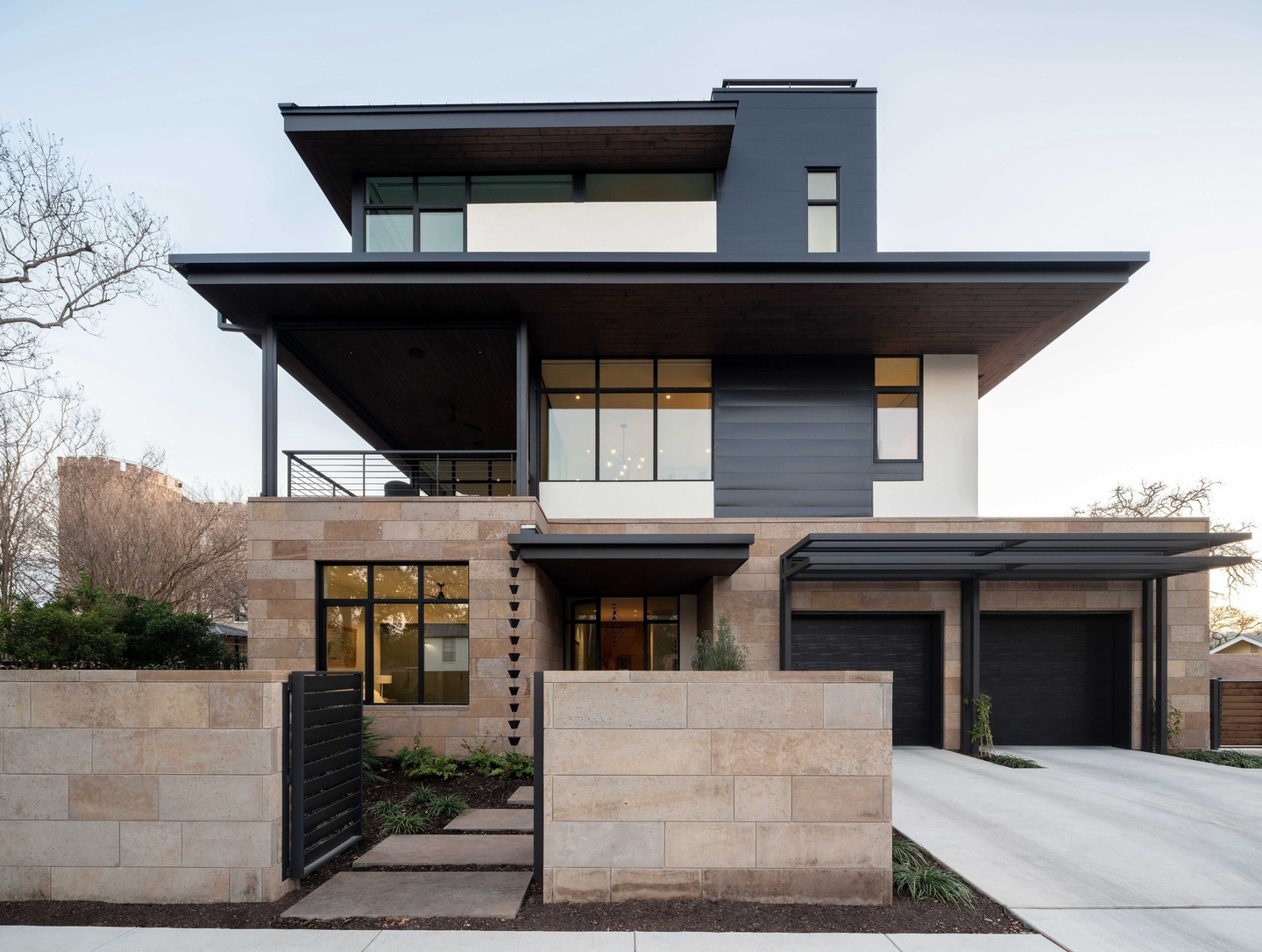 Today's luxury homes blend form and function with sustainable materials. This design incorporates natural stone, energy-efficient windows, and strategic overhangs for passive temperature control. We love bringing the designer's visions to life.

What sustainable features would you add?

Photography: @jakeholt
Architect: @dc_architecture