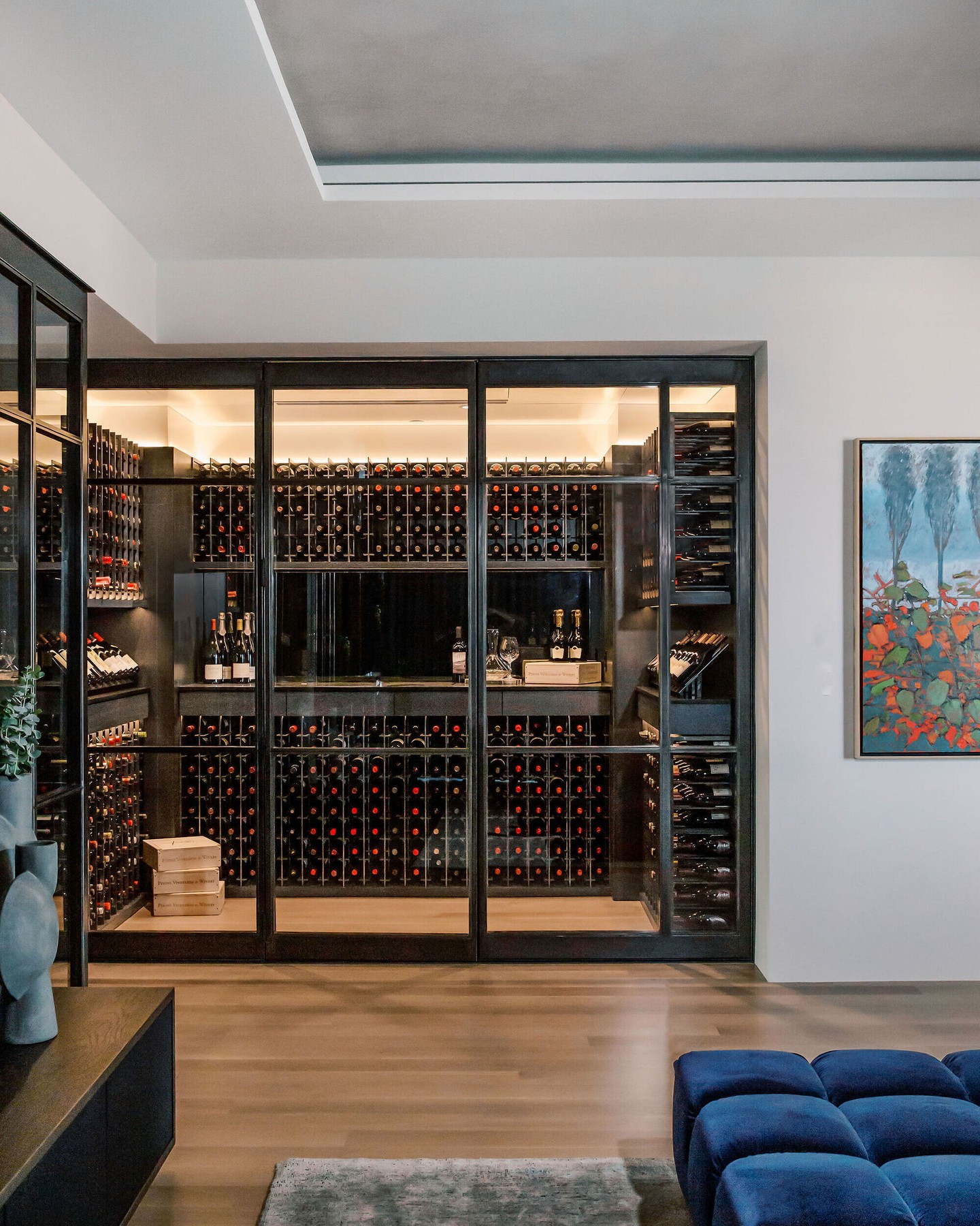 From unused corner to collector's wine room. Multi-layer insulation systems can maintain consistent temperatures year-round, while mixed-format racking supports various bottle shapes without wasting valuable square footage. Swipe to examine the details 

Designer: @urbanspaceinteriors